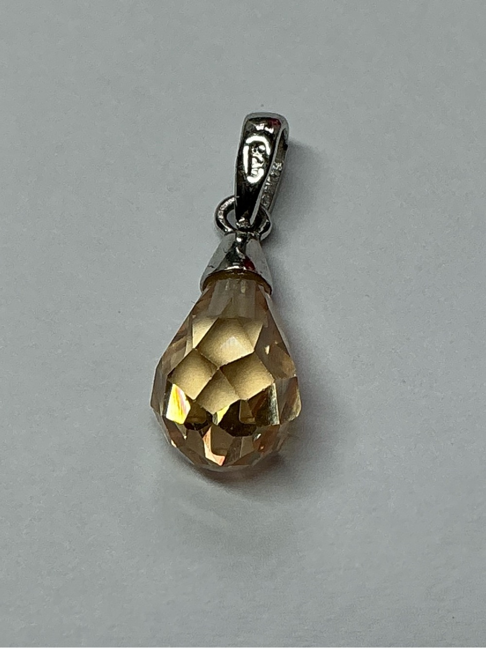 Sterling Silver Teardrop Faceted Crystal Pendant in Champagne